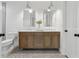 Elegant bathroom with dual sinks, marble countertop, and modern fixtures at 9165 Eves Cir, Roswell, GA 30076