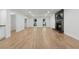 Spacious living room with fireplace and hardwood floors, ideal for entertaining at 9165 Eves Cir, Roswell, GA 30076