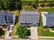 Overhead view of home with manicured lawn, driveway parking, and mature landscaping at 105 Lanier Xing, Hiram, GA 30141