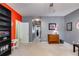 Bonus Room featuring bookshelves and a hallway leading to other rooms at 105 Lanier Xing, Hiram, GA 30141