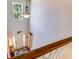 Bright foyer with soaring ceilings, chandelier, and a view of the front door and staircase at 105 Lanier Xing, Hiram, GA 30141