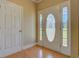 Inviting foyer with hardwood floors and decorative front door at 172 Lakeview Dr, Newborn, GA 30056
