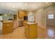 Open kitchen with stainless appliances, ample counter space, and a large island with cooktop at 172 Lakeview Dr, Newborn, GA 30056