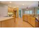 Kitchen with stainless steel appliances and plenty of wooden cabinets at 172 Lakeview Dr, Newborn, GA 30056