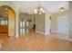 Open living area with hardwood floors, natural lighting, and easy access to the kitchen at 172 Lakeview Dr, Newborn, GA 30056