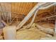 Unfinished attic with exposed rafters, silver duct work, and a wooden subfloor at 172 Lakeview Dr, Newborn, GA 30056