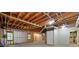 Unfinished basement with exposed ceiling, wood framing, and concrete floors at 2935 Abbottswell Dr, Alpharetta, GA 30022