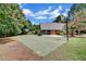 Community basketball court featuring two hoops, court lines, and surrounding greenery at 2935 Abbottswell Dr, Alpharetta, GA 30022