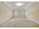 Spacious bedroom with natural light and carpeted floors at 2935 Abbottswell Dr, Alpharetta, GA 30022