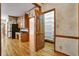 Charming kitchen featuring ample wood cabinetry and a spacious pantry for optimal storage at 2935 Abbottswell Dr, Alpharetta, GA 30022