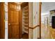 Convenient pantry with ample shelving space adjacent to the kitchen area at 2935 Abbottswell Dr, Alpharetta, GA 30022