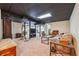 Spacious basement featuring black ceiling, plush carpet, and ample room for living and exercise at 3212 Georgian Woods Cir, Decatur, GA 30034