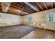 Unfinished basement with exposed ceiling and ample space at 3442 Winter Wood Trl, Marietta, GA 30062