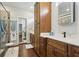Bathroom featuring a wood vanity with a stone countertop at 411 Johnson Rd, Locust Grove, GA 30248