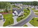 Aerial view of a two-story home with great curb appeal and manicured landscaping at 6080 Simone St, Acworth, GA 30101