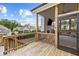 Exterior view of a screened porch with a fireplace and TV screen at 6080 Simone St, Acworth, GA 30101