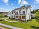 Charming two-story white home with beautiful landscaping and an inviting front porch in a friendly neighborhood at 6080 Simone St, Acworth, GA 30101
