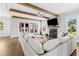Living room features wood beams, a fireplace, and lots of natural light at 6080 Simone St, Acworth, GA 30101