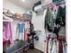 Walk-in closet is organized with plenty of hanging space and shelving at 1802 Lexington Green Pnes, Cumming, GA 30040