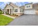 Charming home with a two-car garage, well-manicured lawn, and a paved driveway at 1802 Lexington Green Pnes, Cumming, GA 30040
