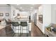 Beautiful kitchen with white cabinets, hardwood floors, and stainless steel appliances at 1802 Lexington Green Pnes, Cumming, GA 30040