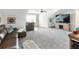 Spacious living room with plush carpeting, comfortable seating, and a ceiling fan at 1802 Lexington Green Pnes, Cumming, GA 30040