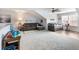 Open concept living room with comfortable seating, a ceiling fan, and ample space for entertaining at 1802 Lexington Green Pnes, Cumming, GA 30040