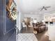 Inviting living room featuring hardwood floors, a ceiling fan and an open floor plan at 1802 Lexington Green Pnes, Cumming, GA 30040