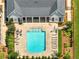 Aerial view of a community pool with lounge chairs and well-manicured landscaping at 1802 Lexington Green Pnes, Cumming, GA 30040