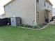 Well-maintained backyard with a storage shed and manicured landscaping, enclosed by a wooden fence at 2380 Cain Cir, Dacula, GA 30019