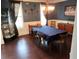 Elegant dining room with rich wood floors, tasteful décor, and decorative wall accents at 2380 Cain Cir, Dacula, GA 30019