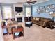 Cozy living room with a fireplace, TV, and comfortable seating at 2380 Cain Cir, Dacula, GA 30019
