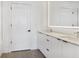 Modern bathroom with double vanity, quartz countertop, and sleek white cabinets at 788 W Marietta Nw St # 1404, Atlanta, GA 30318