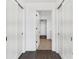 Hallway with new doors that leads to a brightly lit room at 788 W Marietta Nw St # 1404, Atlanta, GA 30318