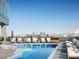 Stunning rooftop pool and lounge area offering panoramic views of the city skyline at 788 W Marietta Nw St # 1404, Atlanta, GA 30318