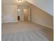 Spacious carpeted bedroom with walk in closet and ensuite bathroom at 9187 Plantation Cir, Covington, GA 30014