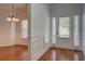 Entryway featuring wood floors and millwork at 9187 Plantation Cir, Covington, GA 30014