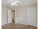 Bedroom featuring neutral walls, carpet, and ceiling fan at 1513 Dupree Rd, Woodstock, GA 30189