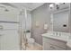 Updated bathroom with glass shower, white vanity, and modern fixtures at 1693 Alderbrook Ne Rd, Atlanta, GA 30345