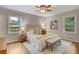 Cozy bedroom with hardwood floors, natural light, and neutral decor at 1693 Alderbrook Ne Rd, Atlanta, GA 30345