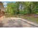 Large wooden deck perfect for outdoor entertaining with a view of the backyard at 1693 Alderbrook Ne Rd, Atlanta, GA 30345