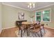 Chic dining room with hardwood floors, modern decor, and natural light at 1693 Alderbrook Ne Rd, Atlanta, GA 30345