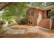 Brick home featuring an inviting entrance with brick steps and well-kept landscaping at 1693 Alderbrook Ne Rd, Atlanta, GA 30345