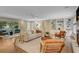 Sunlit living room featuring built-in bookshelves and stylish seating at 1693 Alderbrook Ne Rd, Atlanta, GA 30345