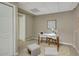 Home office space with a modern desk, comfortable seating, and ample lighting at 1693 Alderbrook Ne Rd, Atlanta, GA 30345