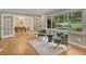 Cozy sitting area with french doors leading to dining room with stylish decor at 1693 Alderbrook Ne Rd, Atlanta, GA 30345