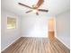 Bedroom features a ceiling fan, and a window that provides natural light at 5952 Medlock Ave, Austell, GA 30106