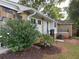 Landscaped backyard with a variety of plants and manicured lawn at 2545 Glenrock Dr, Decatur, GA 30032