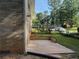 Backyard featuring a quaint patio and a glimpse of the well-maintained green lawn at 2545 Glenrock Dr, Decatur, GA 30032