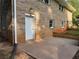 Brick house backyard features a patio with a door entrance to the house at 2545 Glenrock Dr, Decatur, GA 30032